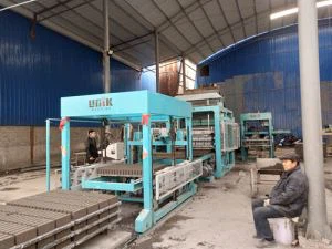 QT12-15 Машина за създаване на блок